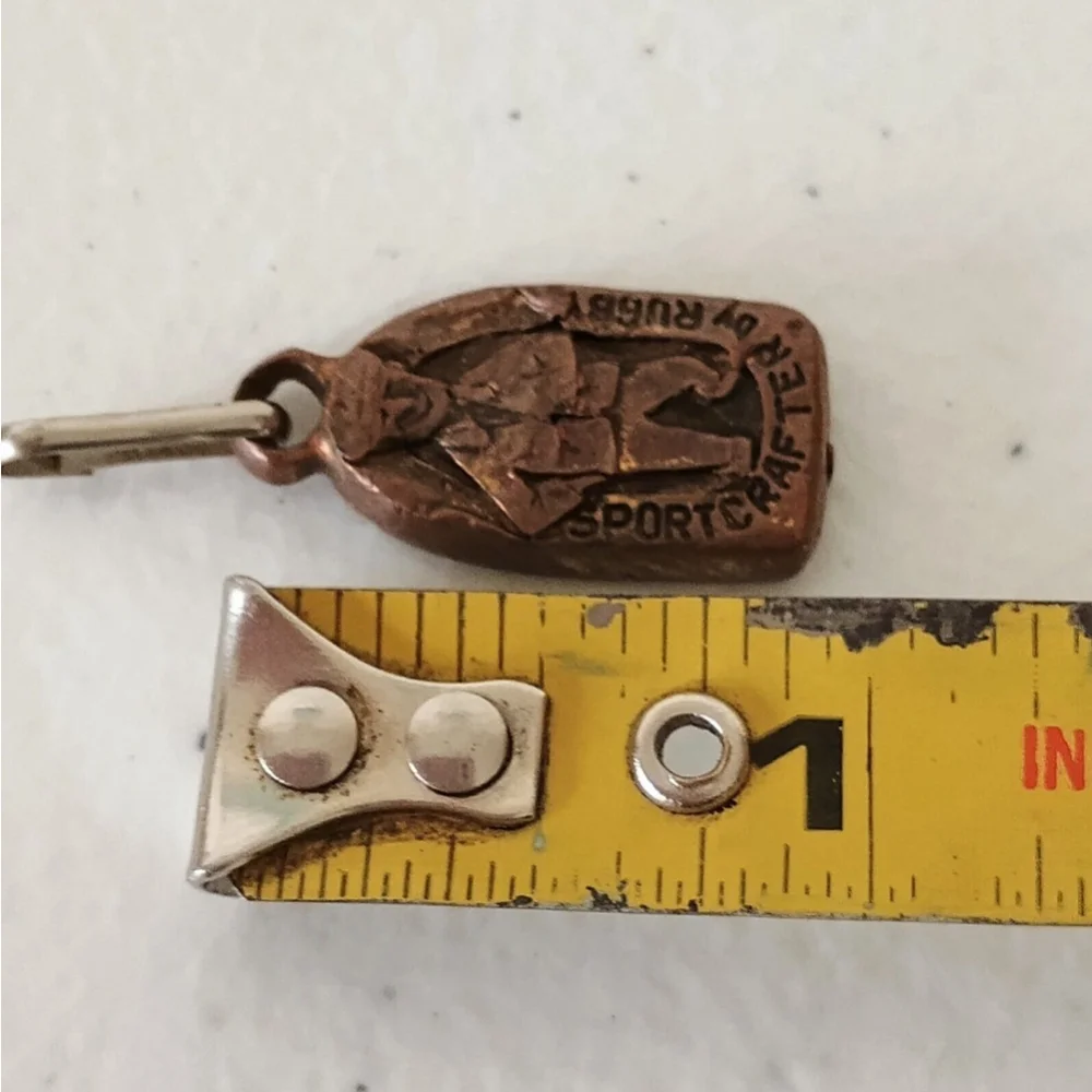 Vintage Sportscrafter By Rugby Metal Pendant Charm Brass Tone